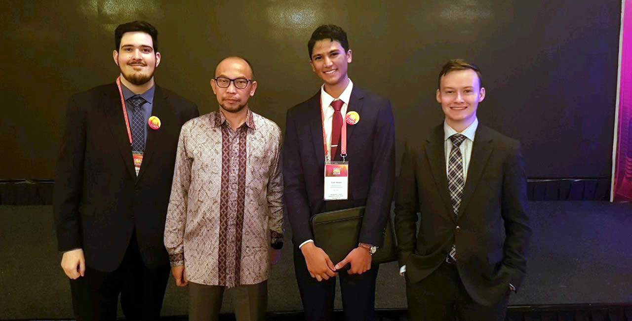 Asia liberty forum standing next to Chatib Basri.