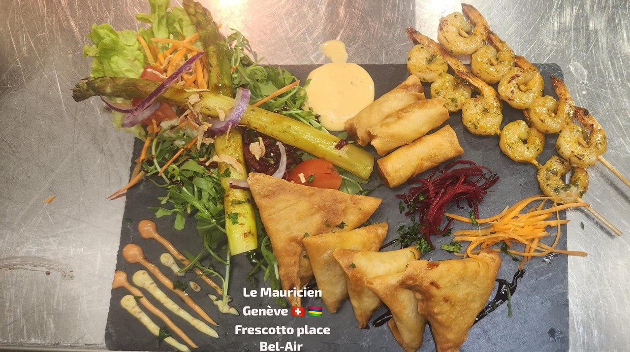 Midyaan Ghoorbin ouvrira un bar à Genève, offrant des apéritifs mauriciens tels que brochettes, samoussas et beignets d'aubergine.